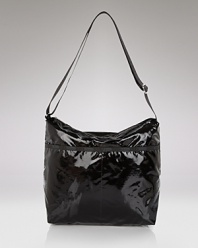 Shiny patent nylon is chic and durable--and full of practical pockets. By LeSportsac.