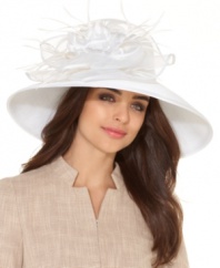Race Day style: this stunning derby hat by August celebrates fashion and function with a romantic large design that shades you from the bright weekend heat.