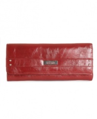 Kenneth Cole's chic wristlet clutch impresses with its minimalist styling, and surprises with organizer pockets and a removable frame coin purse.