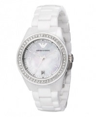 A twinkle in your eye and a shimmer on your wrist. Gleaming watch by Emporio Armani crafted of white ceramic bracelet and round stainless steel and ceramic case. Bezel crystallized with Swarovski elements. Mother-of-pearl dial features silver tone stick indices, numerals at three and nine o'clock, date window at six o'clock, logo at twelve o'clock and three hands. Quartz movement. Water resistant to 50 meters. Two-year limited warranty.