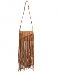 A little fringe goes a long way on this eye-catching design by DKNY. This gorgeous leather bag features long dangling fringe detail and studded silvertone hardware.