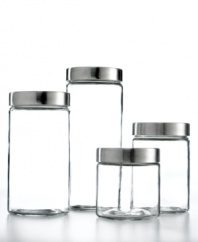 Simple glass canisters with silvertone metal lids offer extensive storage for rice, cereal, pasta and any number of boxed pantry items to preserve freshness and minimize clutter.