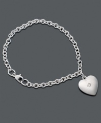 Let her discover the fun of jewelry with this sterling silver bracelet. Heart charm features single diamond accent at center. Approximate length: 6-1/4 inches. Approximate drop of charm: 1/2 inch.