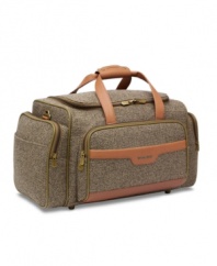 A classic duffel refined for first-class travel, Hartmann's carry-on companion is outfitted in sophisticated tweed with rich, leather accents. With plenty of packing space and a wealth of handy pockets, you'll have no problem reaching your destination. Lifetime warranty.