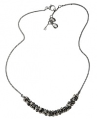 Simple yet stunning. A sparkling row of black crystals adorns this chic chain necklace from Fossil. Crafted in ruthenium tone mixed metal, it includes a lobster claw closure. Approximate length: 18 inches + 2-inch extender.