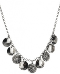 Make the rounds. Circular concave disks with sparkling crystal accents stand out on Kenneth Cole New York's stylish statement necklace. Made in hematite tone mixed metal, it's sure to attract attention whenever you wear it. Approximate length: 16 inches + 3-inch extender.