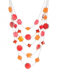 A not-so-elusive illusion necklace! Haskell's bold and bright style features fuchsia and orange square beads, small pink discs, and red faceted cherry beads. Five row design set in silver tone mixed metal. Approximate length: 18 inches + 3-inch extender. Approximate drop: 5 inches.