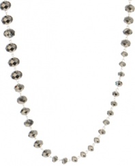 Luminescent layers. Shimmery glass beads with multiple facets glisten in this stylish long strand by Kenneth Cole New York. Set in silver tone mixed metal. Approximate length: 43 inches.