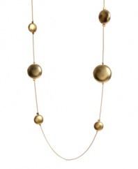 Add a long layer of rich, golden bubbles to your neckline in this light and airy necklace. Crafted in worn gold tone mixed metal; by Kenneth Cole New York. Approximate length: 36 inches.