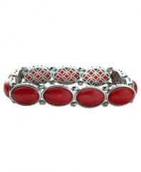 Chic in crimson. Watermelon-dyed jade stones adorn Fossil's stylish stretch bracelet. Set in vintage silver tone mixed metal. Bracelet stretches to fit wrist. Approximate diameter: 2-1/4 inches.