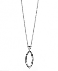 A celebrity favorite, long necklaces are all the rage! T Tahari's elegant style features a cut-out, leaf-shaped pendant. Setting and long chain crafted from hematite tone mixed metal. Base metal is nickel free for sensitive. Approximate length: 32 inches. Approximate drop: 3 inches.