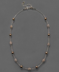 Blazing style by Monet. This Fireball & bead necklace is crafted in mixed metal with bronze glass pearls and topaz-colored crystal accents. Approximate length: 16 inches + 2-inch extender.