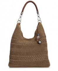 Go boho chic with this on-trend slouchy crochet hobo. This easy-going style by The Sak features logo and feather detailed charms, a wrapped handle and silvertone hardware.