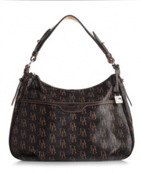 Dooney & Bourke's Collins shoulder bag goes with everything, in a chic 1975-themed signature print.
