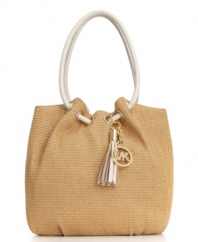 18K gold hardware elevates the classic straw bag to a luxe level with this sophisticated ring tote from MICHAEL Michael Kors.