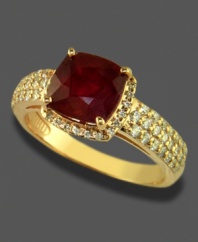 A romantic ring featuring a rich, oval-cut ruby (3-1/8 ct. t.w.) and sparkling round-cut diamonds in a 14k rose gold setting.