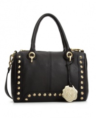 A subtle kick of western-inspired detailing adds a playful feel to the Michelle Satchel from Vince Camuto. This structured leather satchel has a classic shape with gilded metal studs and an optional crossbody strap.