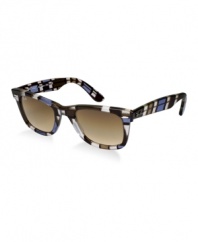 This unique print is inspired by themes that represent the essence of Ray-Ban's history and style. The Ray-Ban Color Block print was influenced by the pop art style of Mondriaan. Using the same shape and style introduced in the '60s, the brown Wayfarer with brown, gradient lenses will get you noticed.