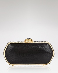 Go ahead and be glamorous with this box clutch from Clara Kasavina. Crafted from leather and Swarovski crystals, this statement piece is ready to take to your next after hours affair.