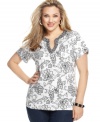 Pair your causal bottoms with Karen Scott's short sleeve plus size top, featuring a lively print.