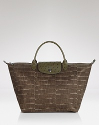 Lonchamp's croc-embossed Le Pliage handbag shows off with ostrich-embossed accents.