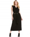 A belted waist lends a lean silhouette to Calvin Klein's cap sleeve plus size maxi dress-- dazzle from desk to dinner!
