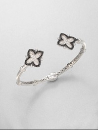 From the Soho Collection. This narrow design features white sapphire and black spinel accented clover-shaped end caps. White sapphiresBlack spinelSterling silverLength, about 7.5Slip-on styleImported 