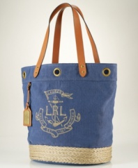 Inspired by the effortless chic of a classic espadrille, this roomy canvas tote from Lauren by Ralph Lauren embodies the breezy style of the exotic islands of its namesake. Antiqued golden grommets, braided jute trim and a nautical anchor print make it the perfect companion for any summer escape.