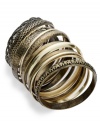 Lucky 13! Bar III's industrial-cool bangle set features 13 separate bangles. Includes a chic mix of gold and black tone with varying textures. Crafted in burnish copper-plated mixed metal. Approximate diameter: 2-1/2 inches.