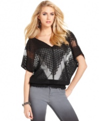 A hot layering piece, this GUESS? lace top adds an element of dark romance to your summer look!