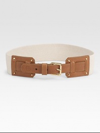 A wide, stretchy design with supple leather and a goldtone metal buckleWidth, about 2Made in USA