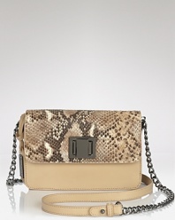 Make an exotic your next statement with this snake embossed bag from Badgley Mischka. In perfect step with this season's mini bag trend, this style is sure to pique animal instincts.