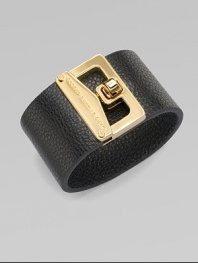 A wide, pebbled leather style with a chic logo accented, turn-lock closure. Leather10K goldplated zincLength, about 7½Turn-lock closureImported 