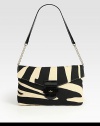 A zebra print adds ultra-chic style to this flap-top design of cotton canvas, topped with patent leather accents. Patent leather and chain shoulder strap, 11 dropBuckled flap closureOne inside zip pocketTwo inside open pocketsFully lined11W X 7H X 3¼DImported