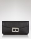 No girl's closet is complete without a black clutch, and this style from MARC BY MARC JACOBS is a step beyond basic. In embossed leather with silvery hardware, it's a timeless accessory.