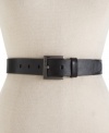 A rich, leather belt with gunmetal hardware and logo-embossed loop gives you a leg up on the competition. By Calvin Klein.