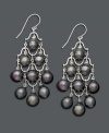Nothing says elegance like pearls. Pretty cultured Tahitian pearls (7-8 mm) combine with sterling silver to create a polished pair of chandelier earrings, perfect for day or night. Approximate drop: 2-1/2 inches.