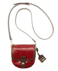 Croc embossing and contrast stitching add dimension to the rounded silhouette of this elegant leather (and perfectly mini!) crossbody purse from Dooney & Bourke.