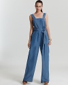Flaunt '70-inspired style in a MARC BY MARC JACOBS jumpsuit and work retro flair at its best. The wide-leg silhouette is pleated at the bodice, belted at the waist and boasts a square neckline for a truly cool look for day or night. Wedges finish the look with authentic appeal.