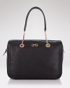 Make a luxe statement with this ultra-chic satchel from Salvatore Ferragamo. Gleaming hardware adds chic shine.