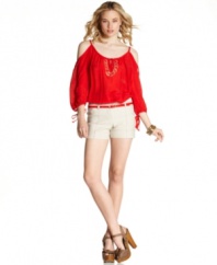 A skinny belt adds a splash of fun color to these chic, seamed shorts from BCX!