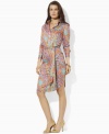 A classic petite shirtdress is rendered in bold paisley cotton poplin and finished with a self-belt waist for a figure-flattering fit from Lauren by Ralph Lauren. (Clearance)