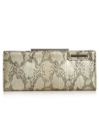Accentuate any outfit with this pretty python print design by Kenneth Cole Reaction.Brushed metallic hardware and detail stitching add extra allure, while its precisely organized interior includes plenty of pockets and compartments for all your essentials.