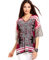 Rhinestones add a glam appeal to this boldly printed petite Alfani tunic -- perfect over leggings or skinny jeans!