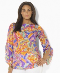 A sweeping paisley pattern and flowing silhouette combine to create the bold plus size Lauren by Ralph Lauren tunic, rendered in luxe silk.