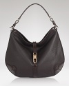 A sleek and simple tab folds over to close this ever-so-luxe hobo from Burberry, a slouchy shape with an effortless feel.