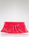 Take this season's bold hues out for the night with this python-embossed leather clutch from Lauren Merkin. In a cute and clutchable shape, it's the evening bag we want bright now.