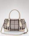 Elegance is easy with this classic checked tote from Burberry. Take it to work and out to weekend brunch.