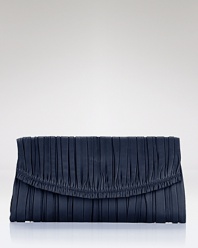 From dusk til dawn, this leather clutch from Elie Tahari is the ultimate dress upper. Super soft and sized for the essentials, it looks effortless under your arm.