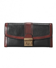 Contrast stitching and brasstone hardware lend Fossil's clutch wallet vintage-inspired charm.